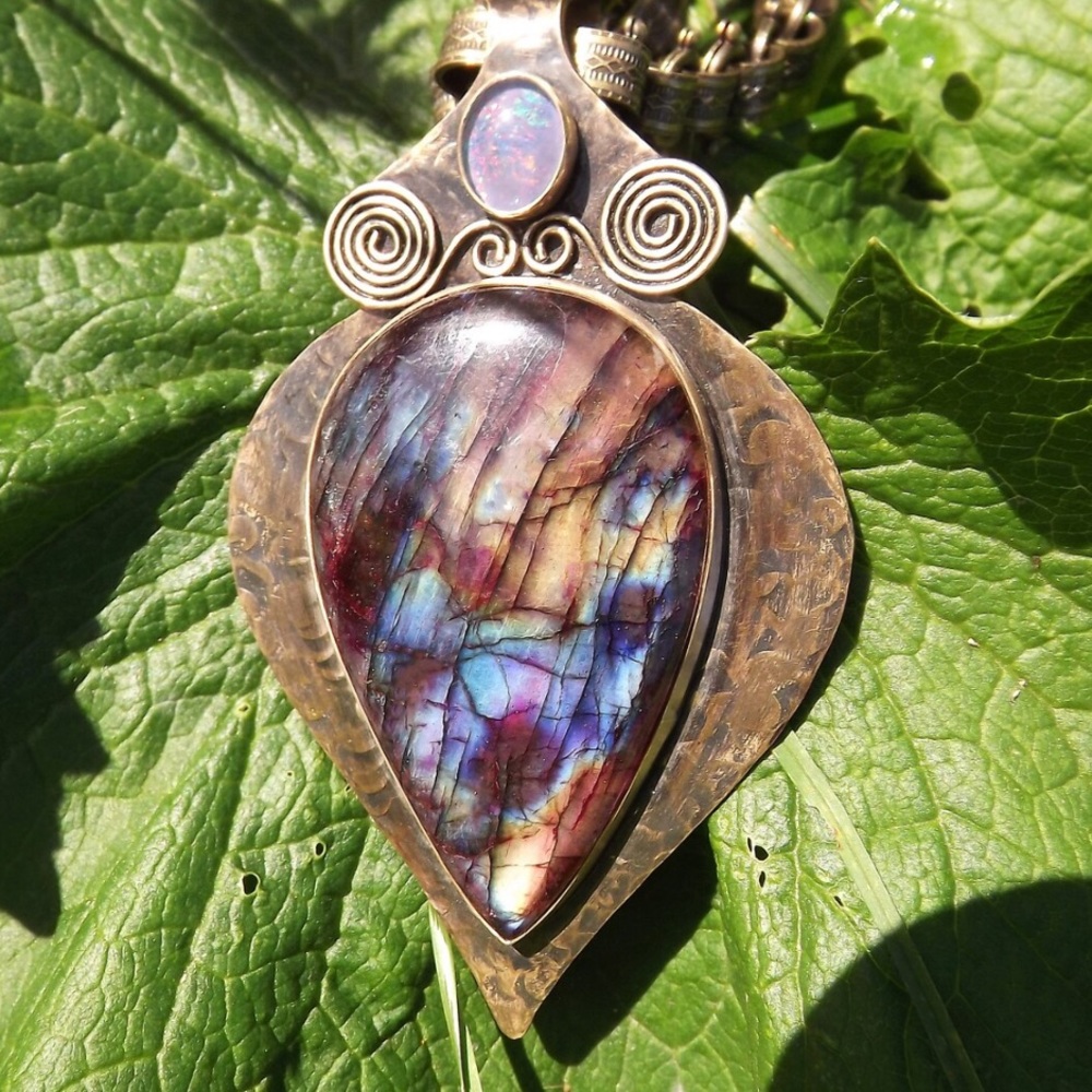 Patrician art spectrolite with black opal